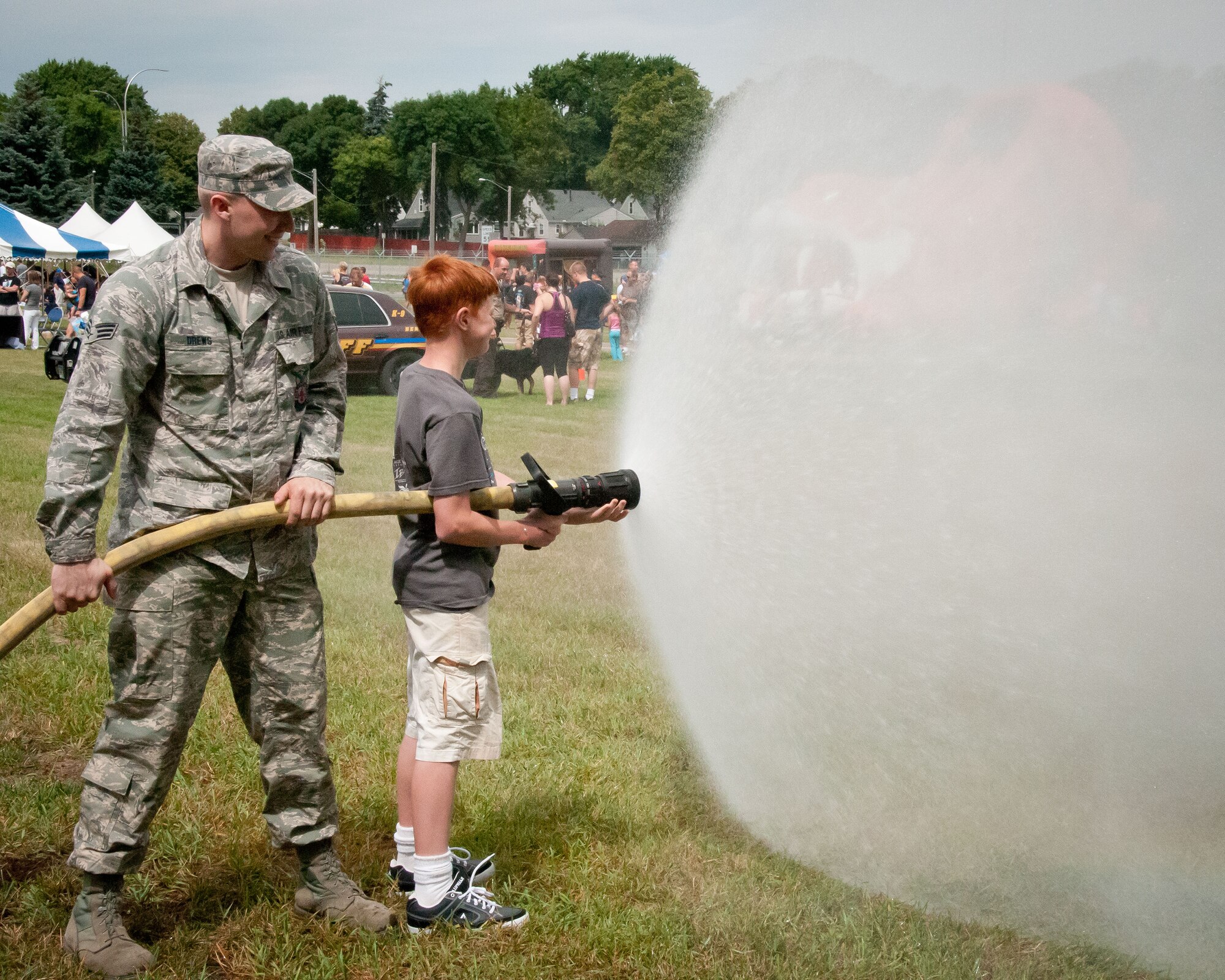 Friends and families of the 934th Airlift Wing Airmen come enjoy this year's Family Day festivites.  The annual event is an opportunity for the Airmen to invite their family out to the base for a picnic lunch, raffles, displays, and many other activities.  (U.S. Air Force photo/934th Airlift Wing Public Affairs)