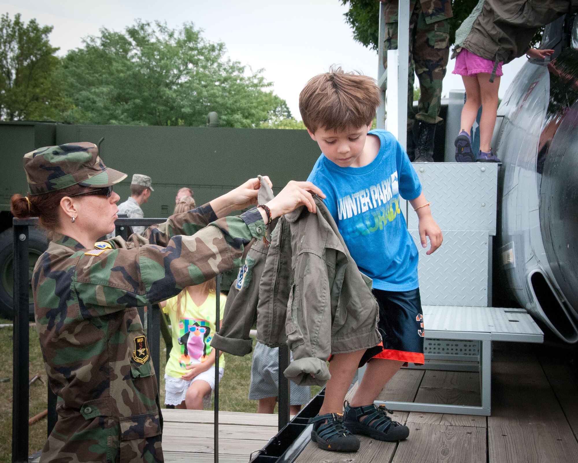 Friends and families of the 934th Airlift Wing Airmen come enjoy this year's Family Day festivites.  The annual event is an opportunity for the Airmen to invite their family out to the base for a picnic lunch, raffles, displays, and many other activities.  (U.S. Air Force photo/934th Airlift Wing Public Affairs)