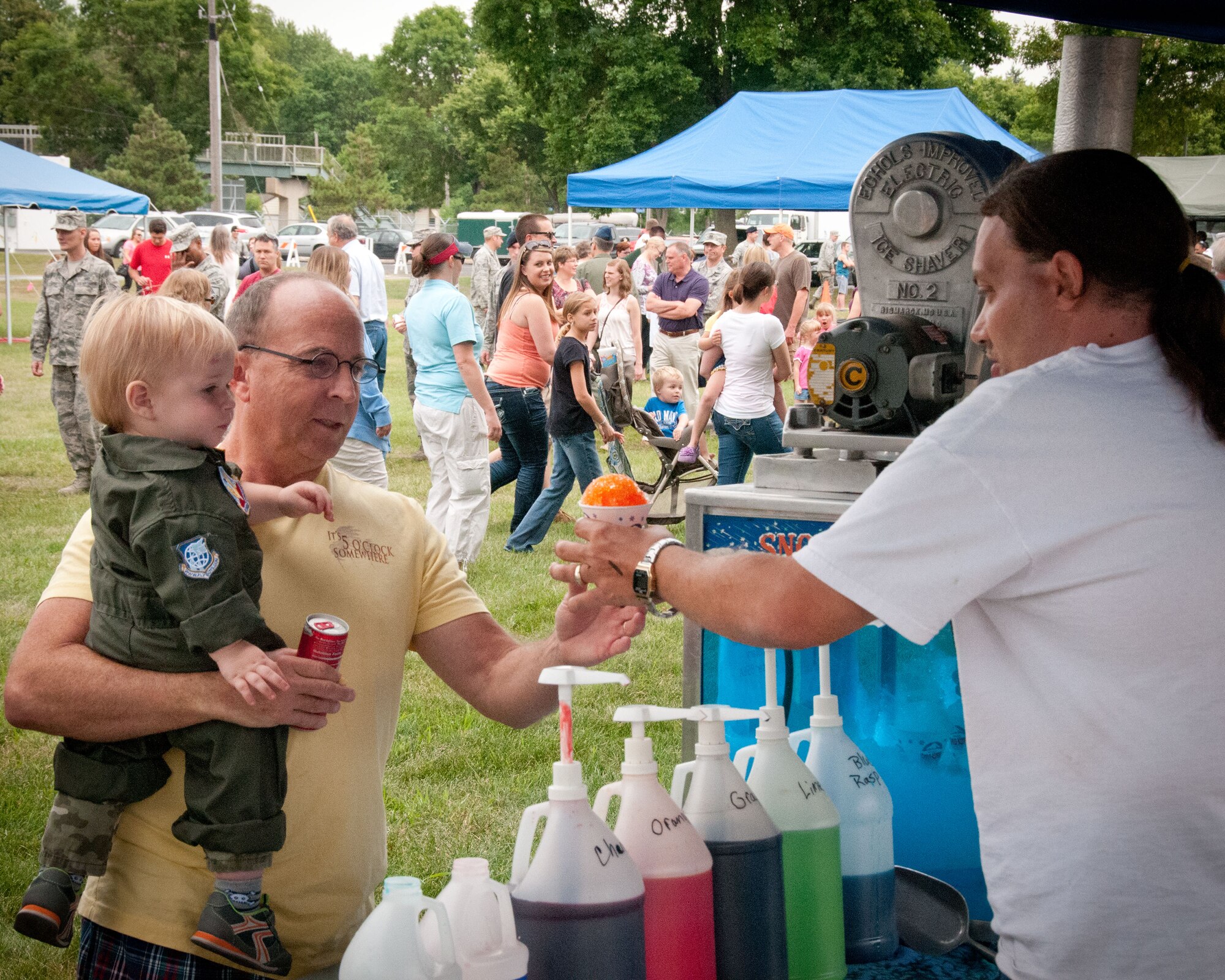 Friends and families of the 934th Airlift Wing Airmen come enjoy this year's Family Day festivites.  The annual event is an opportunity for the Airmen to invite their family out to the base for a picnic lunch, raffles, displays, and many other activities.  (U.S. Air Force photo/934th Airlift Wing Public Affairs)