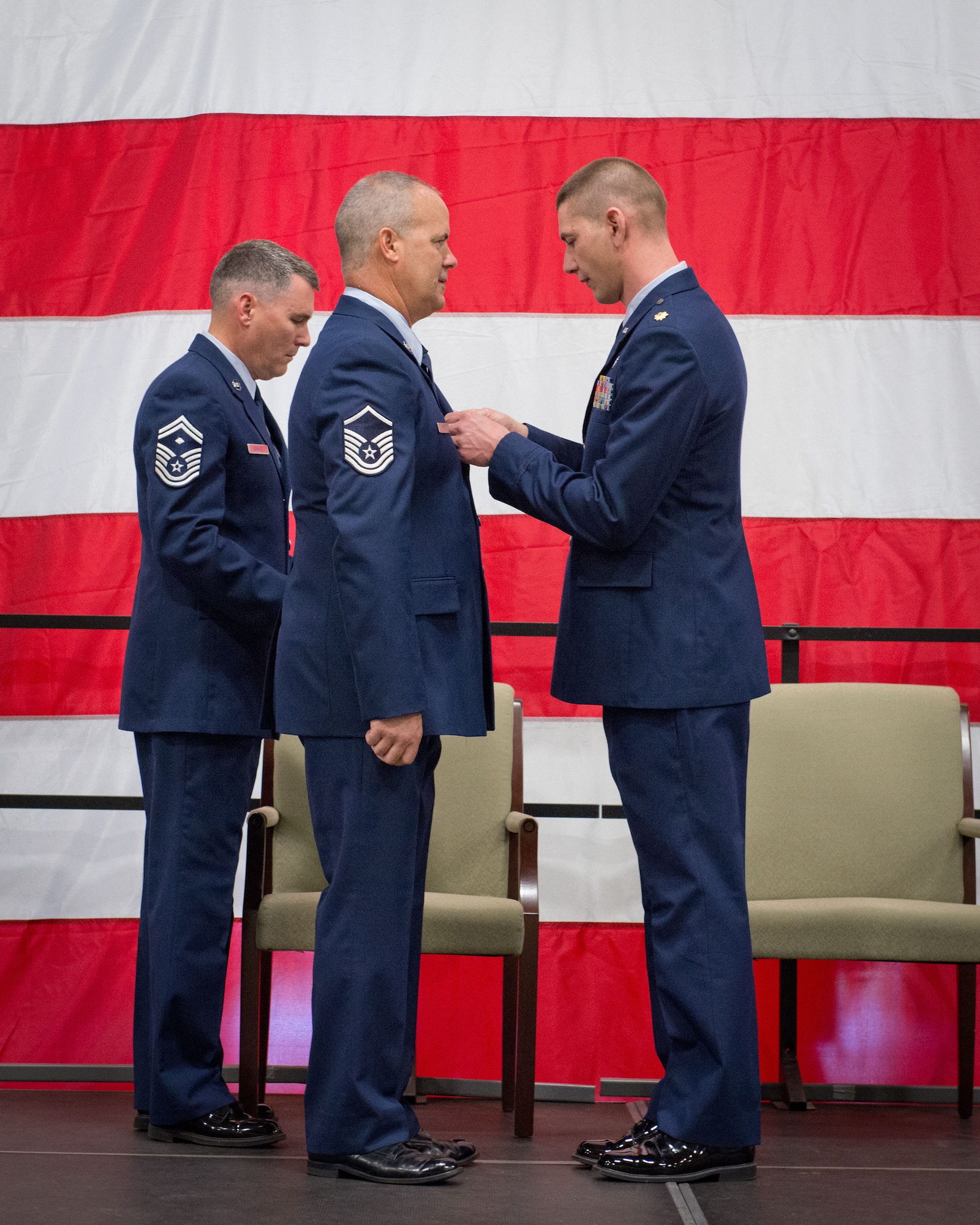 Maj. Lance Goette, 934th Maintenance Squadron executive officer, presents Master Sgt. Thomas Donnely with his Meritorious Service Medal at his retirement ceremony during the August Unit Training Assembly weekend.  (U.S. Air Force photo/SrA Trevor Saylor)