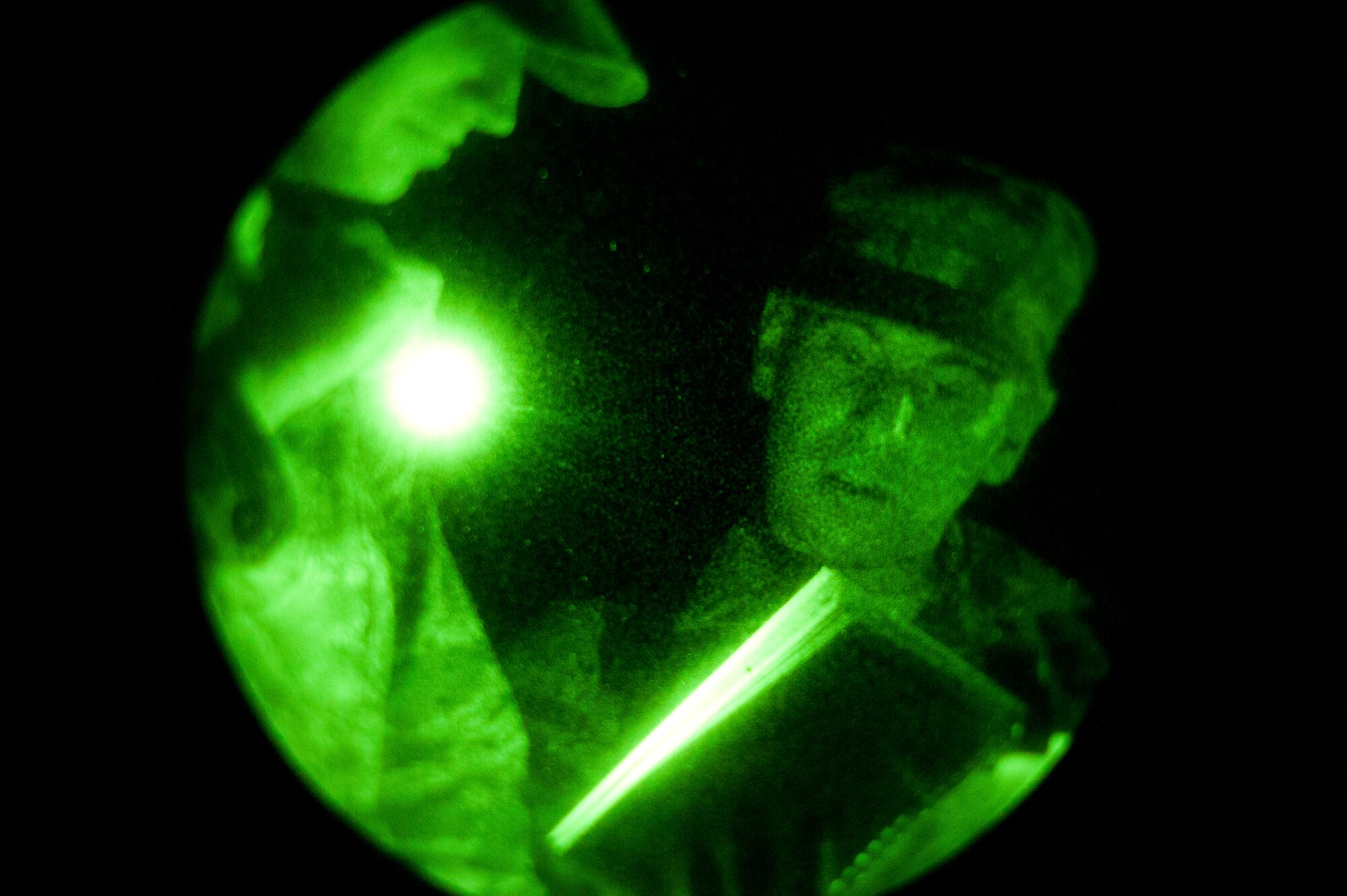 KUNSAN AIR BASE, Republic of Korea -- Senior Airman Dennis Petzold, 8th Civil Engineer Squadron exercise post-attack reconnaissance team lead, reviews an unexploded ordinance worksheet after discovering a simulated live mortar during an operational readiness exercise Aug. 8, 2013. Using Air Forces Pamphlet 10-100 or other manuals, PAR teams are able to quickly identify dangers and relay them up the chain. (U.S. Air Force photo by Senior Airman Armando A. Schwier-Morales/ Released)