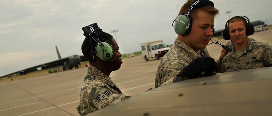 Before a B-52H Stratofortress leaves Minot Air Force Base, N.D., it must pass an inspection by a crew chief assigned to the 5th Aircraft Maintenance Squadron. Crew chiefs are responsible for ensuring the aircraft is in perfect working condition. They also perform scheduled inspections and preventive maintenance on B-52s and the equipment installed inside the aircraft. Crew chiefs also execute post-flight examinations to ensure the aircraft remains in ready condition. (U.S. Air Force photos/Senior Airman Brittany Y. Auld)