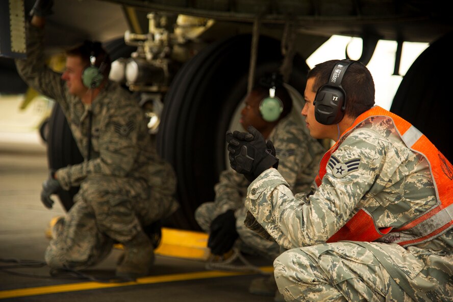 Airmen assigned to the 5th Aircraft Maintenance Squadron perform a B-52H Stratofortress launch at Minot Air Force Base, N.D. Before B-52s depart Minot AFB, they must pass inspections by 5th AMXS crew chiefs. (U.S. Air Force photo/Senior Airman Brittany Y. Auld)