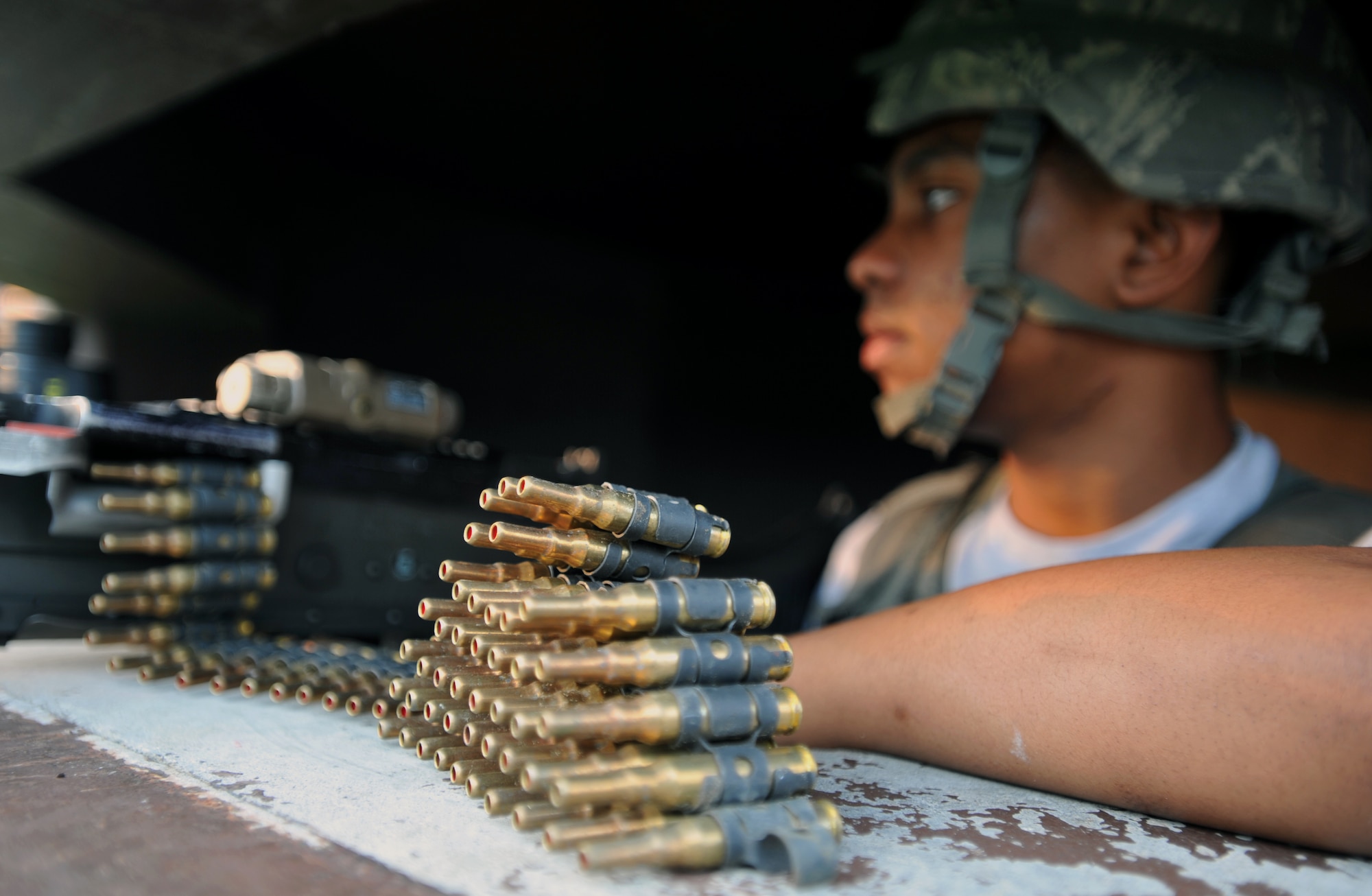 Airman 1st Class Robert Roland, 51st Security Forces Squadron entry controller, stands guard during Operational Readiness Exercise Beverly Midnight 13-03 at Osan Air Base, Republic of Korea, Aug. 7, 2013. Defenders like Roland are charged with protecting the base and its inhabitants at all costs. (U.S. Air Force photo/Senior Airman Siuta B. Ika)