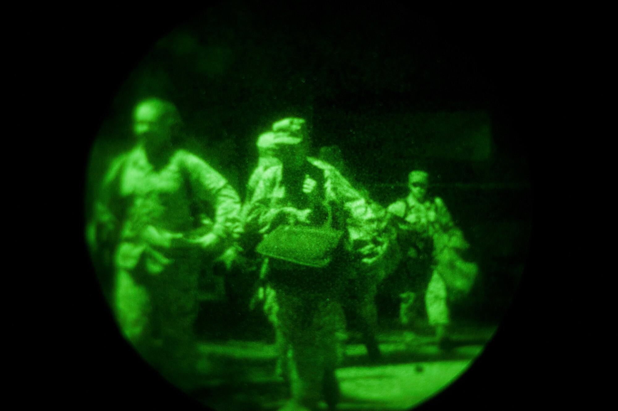 KUNSAN AIR BASE, Republic of Korea -- Members of the 8th Civil Engineer Squadron unit control center evacuate a building after a simulated positive identification of an unexploded ordinance during an operational readiness exercise Aug. 8, 2013. The “Red Devils” practiced transferring command, relocating and continuing operations as smoothly as possible. (U.S. Air Force photo by Senior Airman Armando A. Schwier-Morales/ Released)