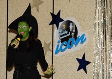 Airman 1st Class Sydney Manning, 1st Combat Camera Squadron videographer, sings during the Air Mobility Command Icon Talent Contest Aug. 1, 2013, at Joint Base Charleston - Air Base, S.C. The AMC Icon program is loosely based on the hit TV program, “American Idol.” Manning, from Nampa, Idaho, performed Idina Menzel’s “The Wizard and I.” (U.S. Air Force photo/ Airman 1st Class Chacarra Neal)