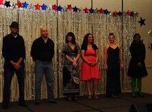Contestants wait for the judges results during the Air Mobility Command Icon Talent Contest Aug. 1, 2013, at Joint Base Charleston - Air Base, S.C. All participants are equally eligible to win the base-level contests however, only AMC active duty Air Force members (to include AMC affiliate units (guard and reservists), will be permitted to represent their installations in the command finals.  The AMC Icon command finals are designated as an official AF function and as such is limited to AD participants.  The top rated participant from each base will be that installation’s representative in the command finals and a video of their performance will be forwarded to compete. (U.S. Air Force photo/ Airman 1st Class Chacarra Neal)