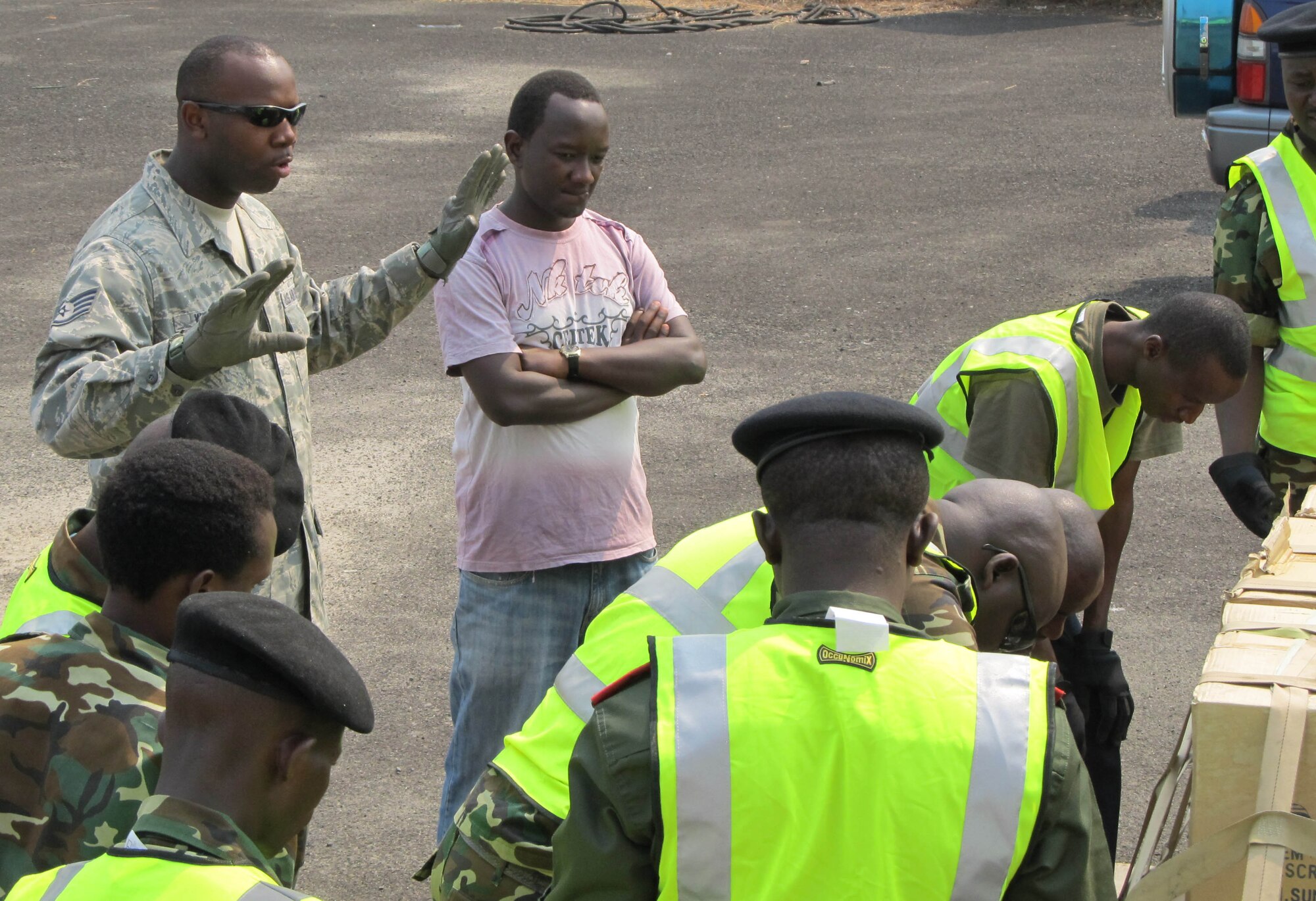 BUJUMBURA, Burundi – Staff Sgt. Arthur Wilborn, 818th Mobility Support Advisory Squadron air advisor, instructs Burundi Airmen during phase two of the African deployment assistance partnership team program phase two, July 18, 2013. Phase two of the ADAPT program is a partnership engagement on cargo preparation and load planning operations. (curtesy photo)