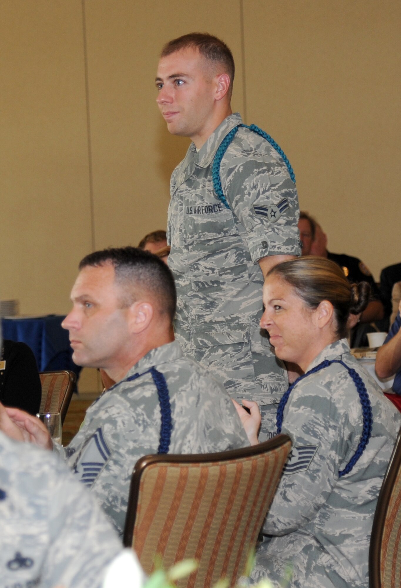 Airman 1st Class Jason Verges, 338th Training Squadron student Airman, is recognized as a representative of the teal rope program during the Biloxi Chamber of Commerce Morning Call Aug. 7, 2013, hosted by Keesler Air Force Base, Miss., at the Bay Breeze Event Center.  Teal ropes are student leaders who assist the base’s sexual assault prevention and response program.  (U.S. Air Force photo by Kemberly Groue)