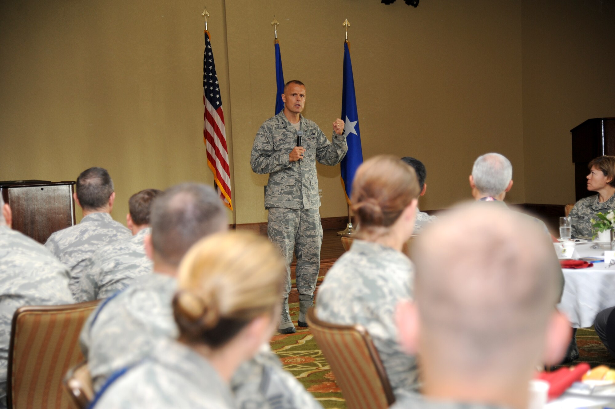 Brig. Gen. Brad Spacy, 81st Training Wing commander, delivers remarks during the Biloxi Chamber of Commerce Morning Call Aug. 7, 2013, hosted by Keesler Air Force Base, Miss., at the Bay Breeze Event Center.  (U.S. Air Force photo by Kemberly Groue)