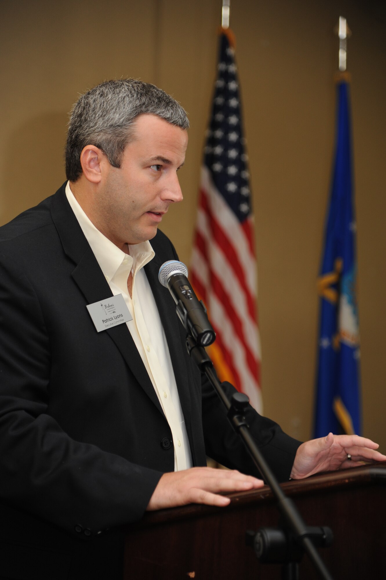 Patrick Lyons, Biloxi Chamber of Commerce board president , speaks to attendees during the Biloxi Chamber of Commerce Morning Call Aug. 7, 2013, hosted by Keesler Air Force Base, Miss., at the Bay Breeze Event Center.  (U.S. Air Force photo by Kemberly Groue)