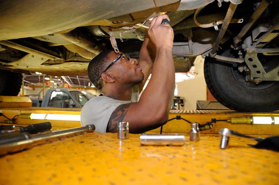 Airman 1st Class Jamil Dixon, 2nd Logistics Readiness Squadron vehicle maintenance journeyman, works on a vehicle's fuel systems on Barksdale Air Force Base, La., Aug. 6, 2013. The vehicle maintenance flight's responsibilities include maintaining Barksdale's motor pool and ensuring all vehicles that come in, leave in top condition. (U.S. Air Force photo/Airman 1st Class Andrew Moua)