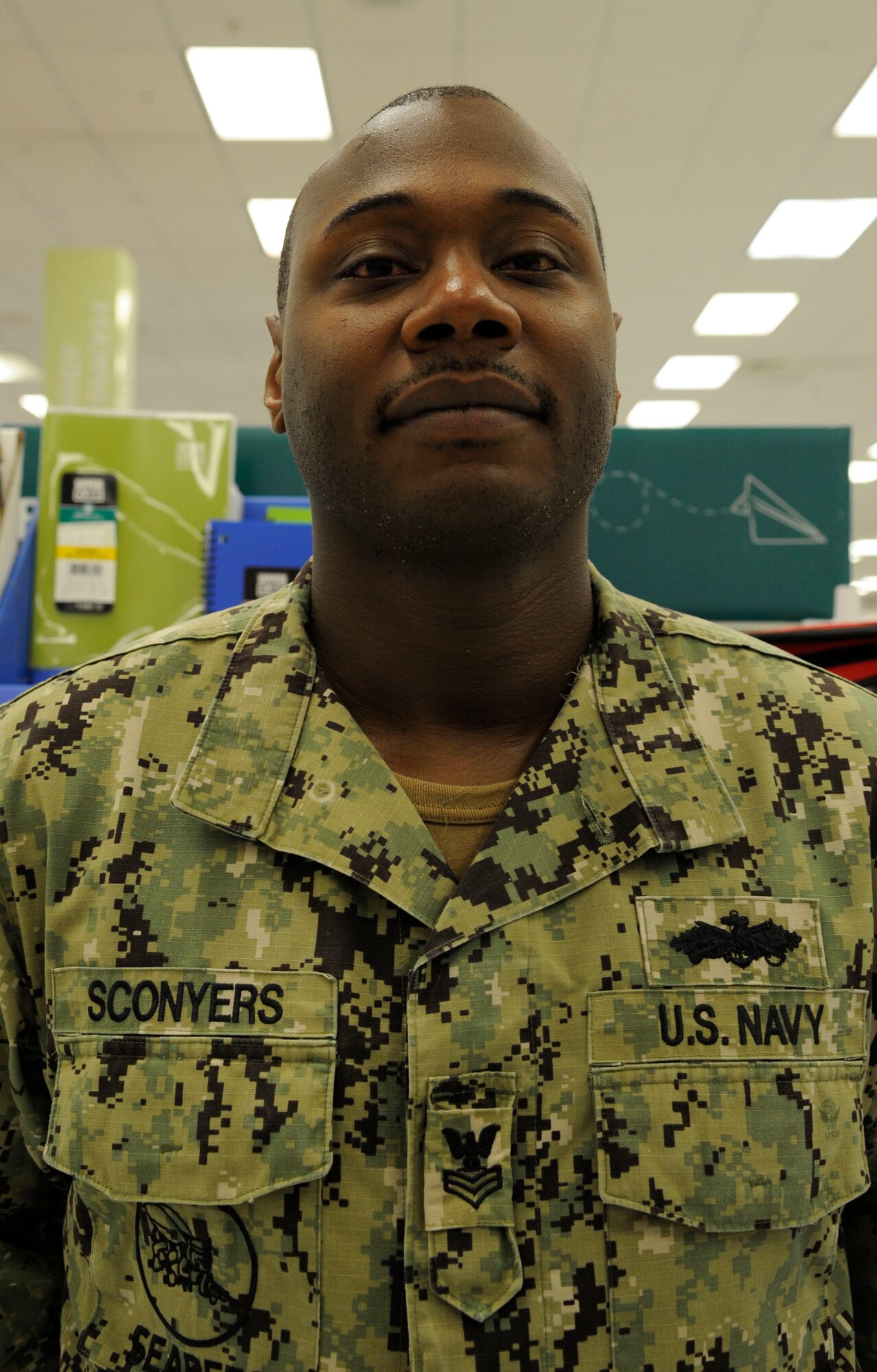 Navy Petty Officer 1st Class James Sconyers, Naval Mobile Construction Battalion Detachment 28, "I sent my family to Gulf Port, Miss., for vacation and prepared my oldest daughter for high school by purchasing new school uniforms and school supplies." (U.S. Air Force photo/Airman 1st Class Andrew Moua)