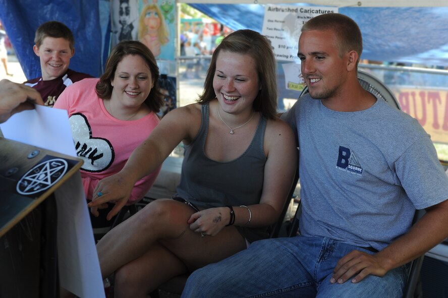 The 2013 North Dakota State Fair set an attendance record. The fair ran from July 19 - 27 and attracted an estimated 320,485 individuals. (U.S. Air Force photo/Airman 1st Class Stephanie Ashley)