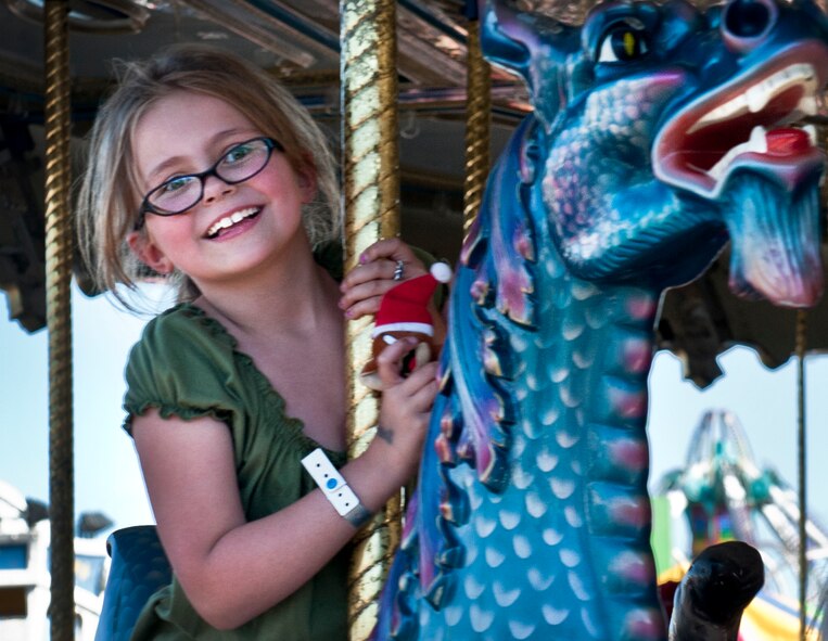 The 2013 North Dakota State Fair set an attendance record. The fair ran from July 19 - 27 and attracted an estimated 320,485 individuals. (U.S. Air Force photo/Airman 1st Class Lauren Pitts)