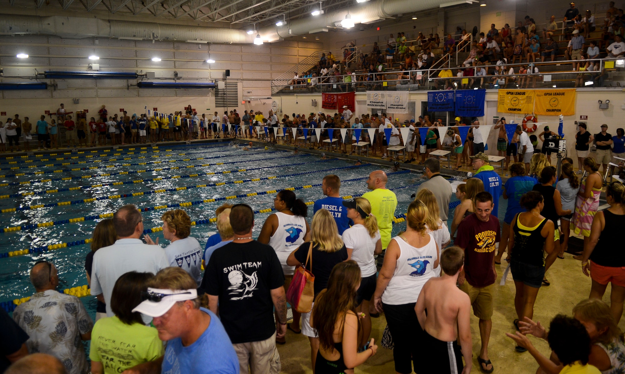 Swimmers and families from across the Hampton Roads area visited Fort Eustis, Va., for the annual Virginia Peninsula Swimming Union and Greater Peninsula Swimming Association championships, Aug. 3, 2013. Approximately 1,000 swimmers and families attended the weekend-long events. (U.S. Air Force photo by Airman 1st Class Austin Harvill/Released)