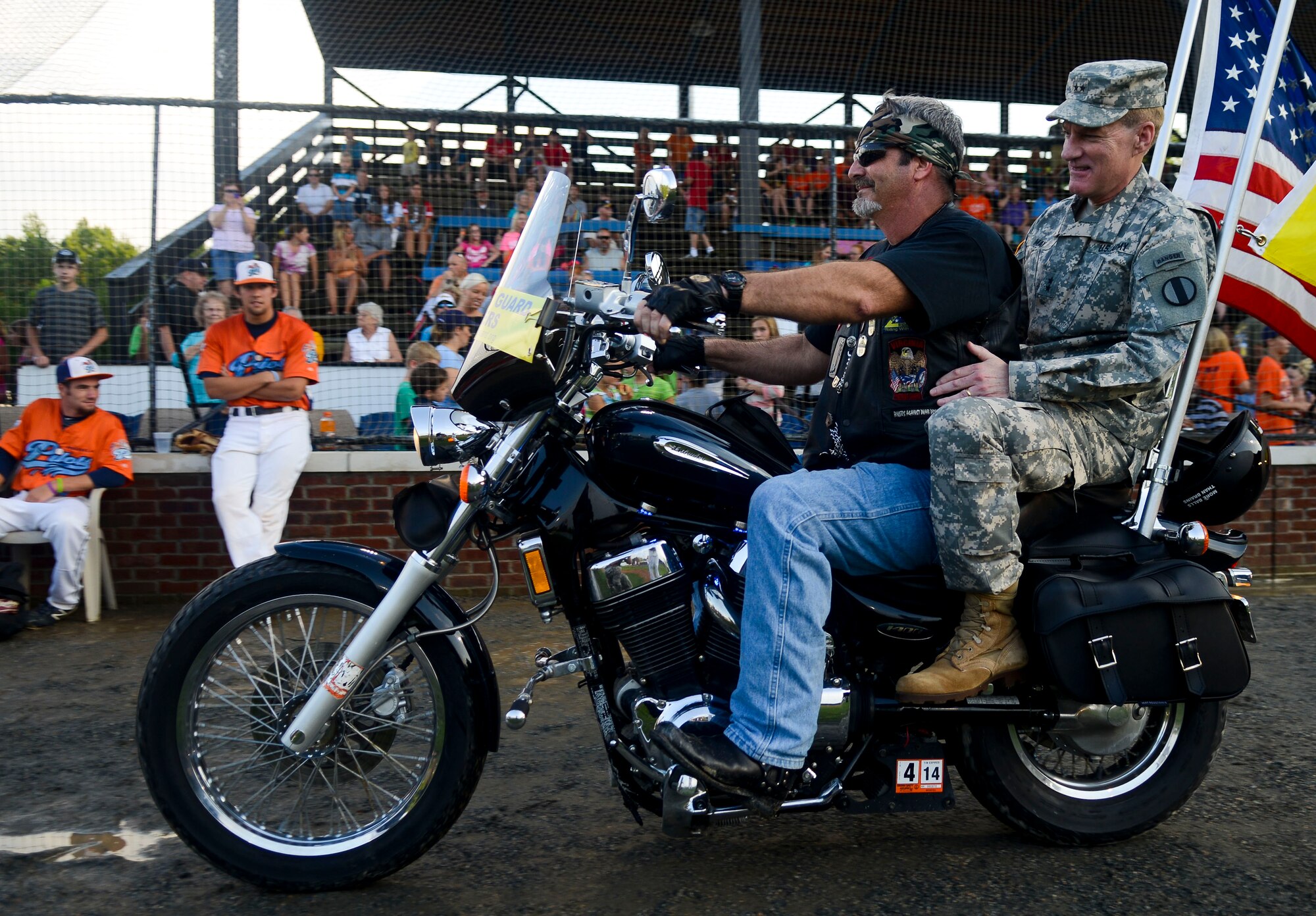 U.S. Army Maj. Gen. Bradley May, Training and Doctrine Command Initial Military Training Center of Excellence deputy commander, rides passenger with a Patriot Guard Rider, Aug. 3, 2013, in Hampton, Va. Gold Star family members had an opportunity to ride with the Patriot Guard, which was one event of many presented in honor of their Service members’ sacrifice and their endurance.
