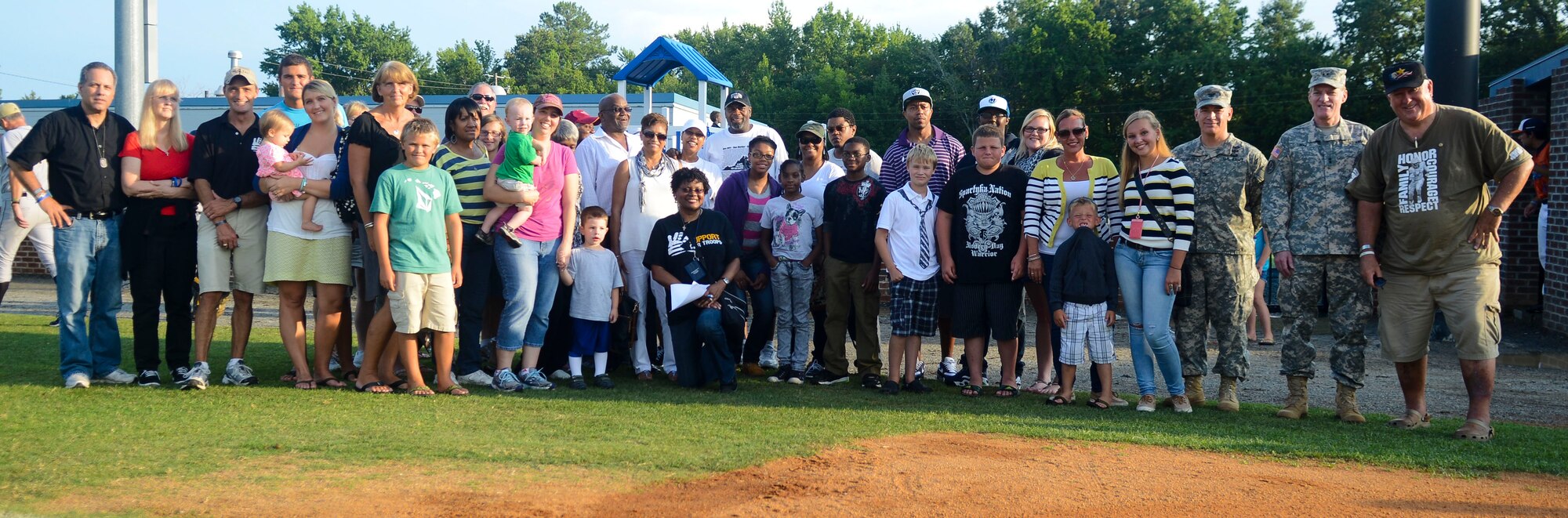 Gold Star family members from across the Hampton Roads area gathered in Hampton, Va., to enjoy a free baseball game, Aug. 3, 2013. Donn Weaver, a Gold Star family member, organized the event in conjunction with Fort Eustis, Va., Survivor Outreach Services. (U.S. Air Force photo by Airman 1st Class Austin Harvill/Released)