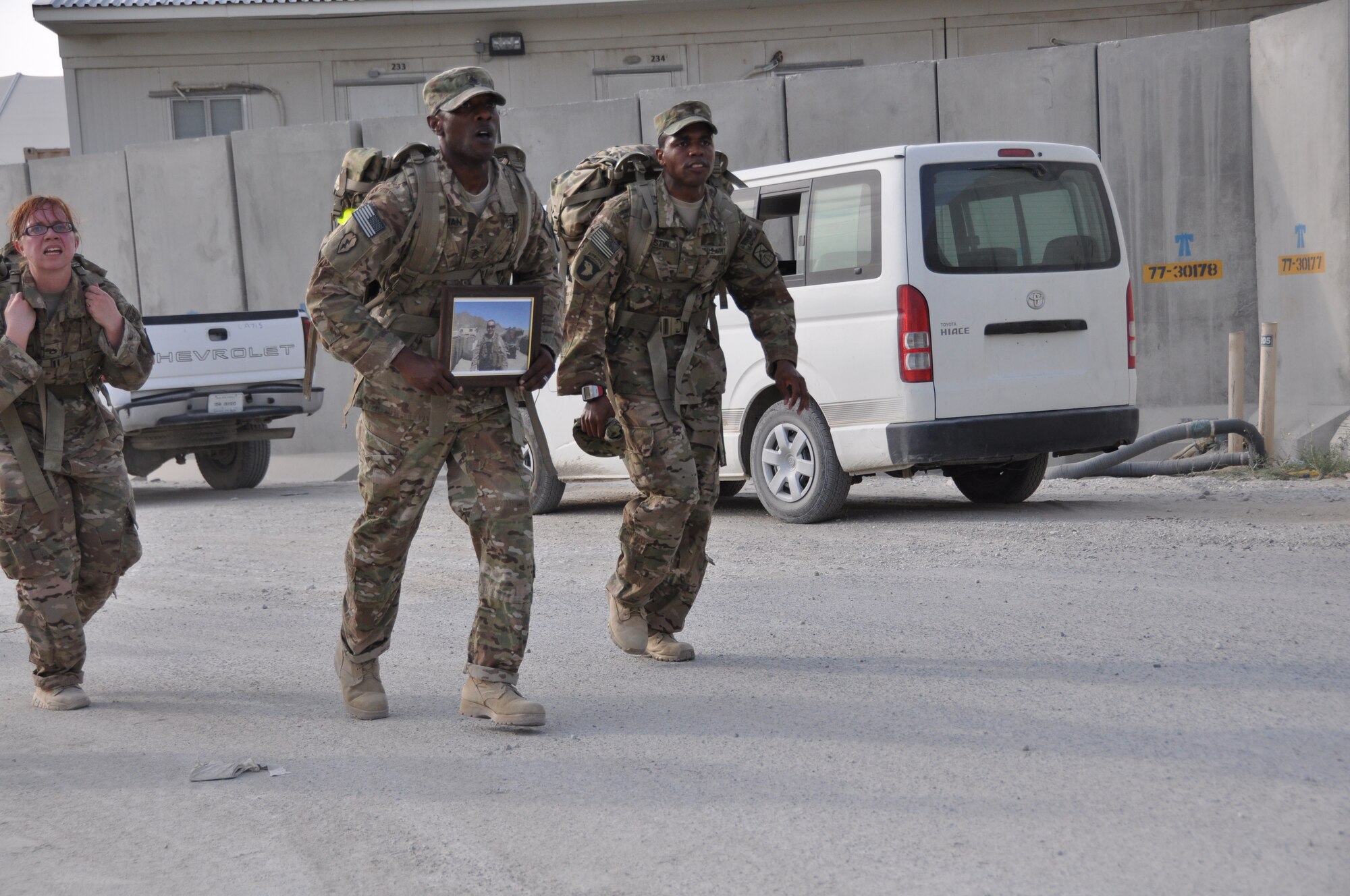 Ninety-two teams participated in the 5-kilometer ‘Got Consent?’ ruck march at Bagram Airfield, Afghanistan, Aug. 3, 2013. The event, hosted by the 455th Air Expeditionary Wing sexual assault response coordinator, was comprised of four-person teams who competed in the march carrying a 30-pound rucksack on their backs. (U.S. Air Force photo/Tech. Sgt. Rob Hazelett)