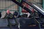 U.S. Air Force Lt. Col. Terry Moultroup and Col. Donald Majercik return Nov. 29, 2012, from a training flight at the Burlington International Airport. Majercik surpassed 1,000 hours of flying time in the F-16 Fighting Falcon during this flight.