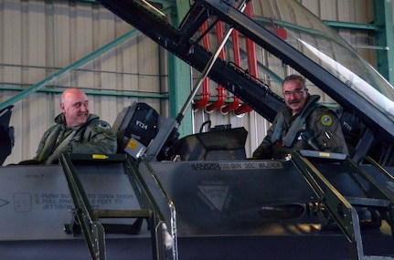 U.S. Air Force Lt. Col. Terry Moultroup and Col. Donald Majercik return Nov. 29, 2012, from a training flight at the Burlington International Airport. Majercik surpassed 1,000 hours of flying time in the F-16 Fighting Falcon during this flight.