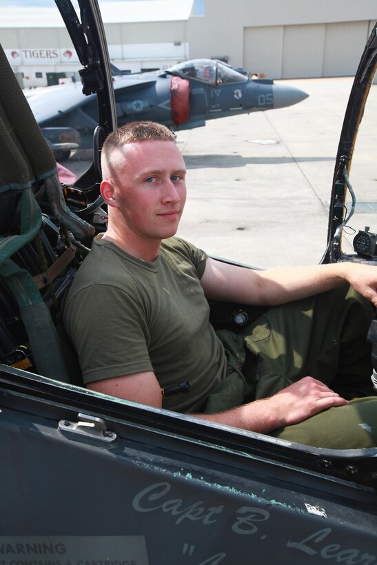 Cpl. Lars M. Comstock, an aircraft communications, navigation and radar systems technician on the AV-8B Harrier for Marine Attack Squadron 223, sits in the cockpit of a Harrier after working with one of the electronic systems that sends the video to the cockpit screens. Aircraft communications, navigation and radar systems technicians for the AV-8B Harrier are tasked with installing, removing, testing, inspecting, maintaining and repairing systems, components and ancillary equipment of all electronic systems on the aircraft.
