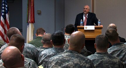 Craig Fugate, administrator of the Federal Emergency Management Agency, talks with attendees of the of the Director of Military Support Course at the Army National Guard Readiness Center in Arlington, Va., Tuesday, January 15, 2013.