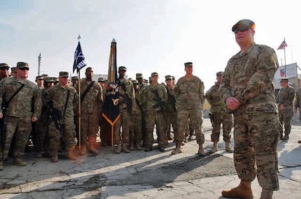 Army General Frank J. Grass, chief of the National Guard Bureau, visits with Army National Guard troops in Kabul, Afghanistan, Jan. 15, 2013.