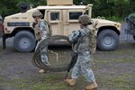 Female soldiers of the 101st Expeditionary Signal Battalion conduct premobilization training Aug. 10, 2012. The battalion, based in Yonkers, deployed to Afghanistan in October 2012.