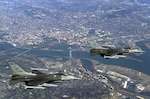 Two U.S. Air Force F-16C Fighting Falcon aircraft fly over the nation's capital on a recent mission.
