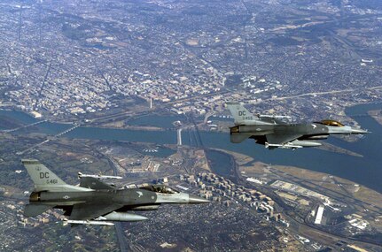 Two U.S. Air Force F-16C Fighting Falcon aircraft fly over the nation's capital on a recent mission.