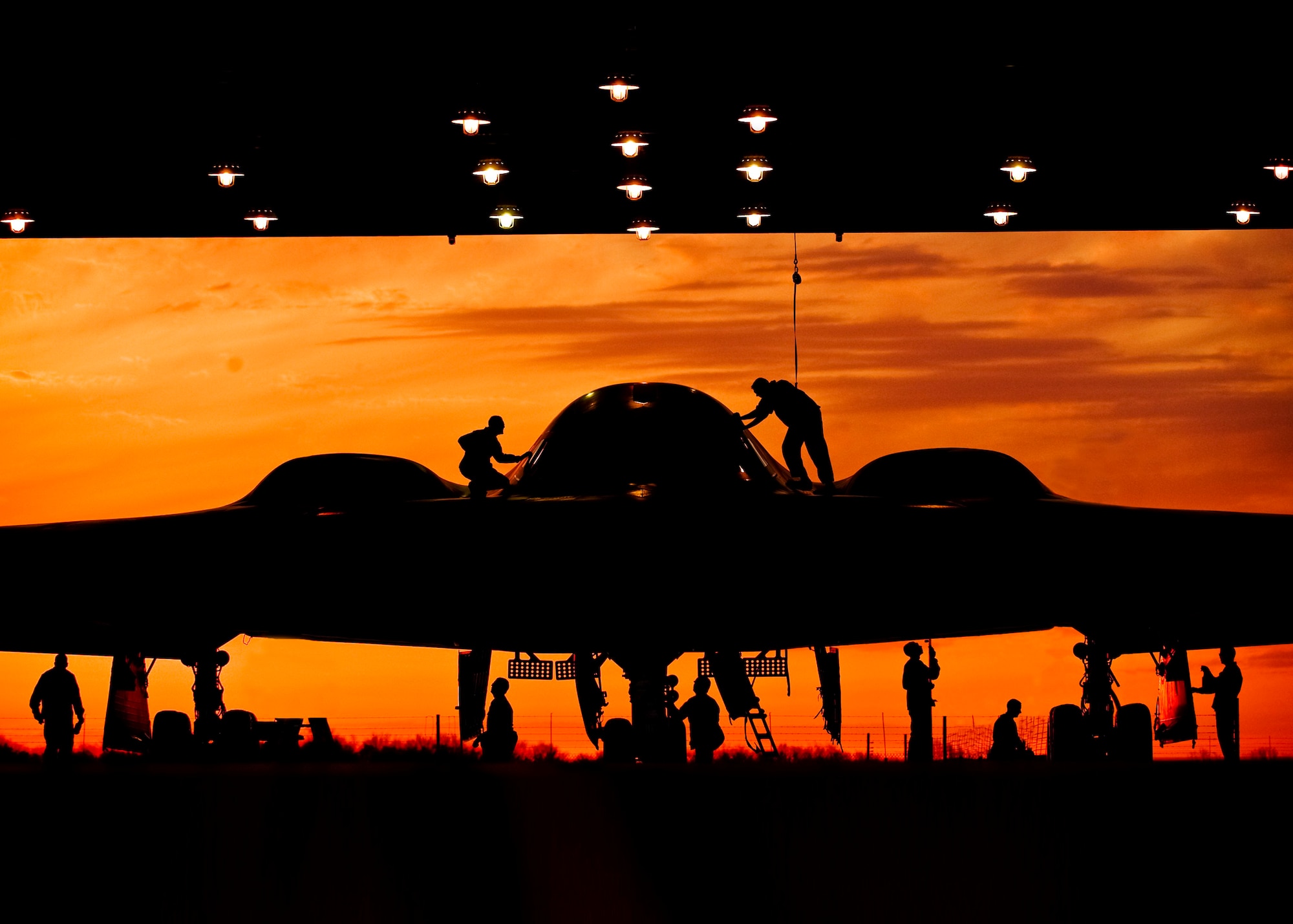 During early morning operations, 131st Bomb Wing Missouri Air National Guard mantainers service a B-2 Stealth at Whiteman Air Force Base, Mo.    (U.S. Air National Guard photo by Master Sgt. Robert Trubia/RELEASED)