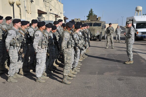 General C. Robert Kehler, U.S. Strategic Command commander, talks to members of the 741st Missile Security Forces Squadron convoy response force July 31 at Malmstrom Air Force Base, Mont. During his visit Kehler also met with 341st Missile Wing leaders and interacted with the Airmen who go out every day to accomplish Malmstrom’s mission. (U.S. Air Force photo/John Turner)