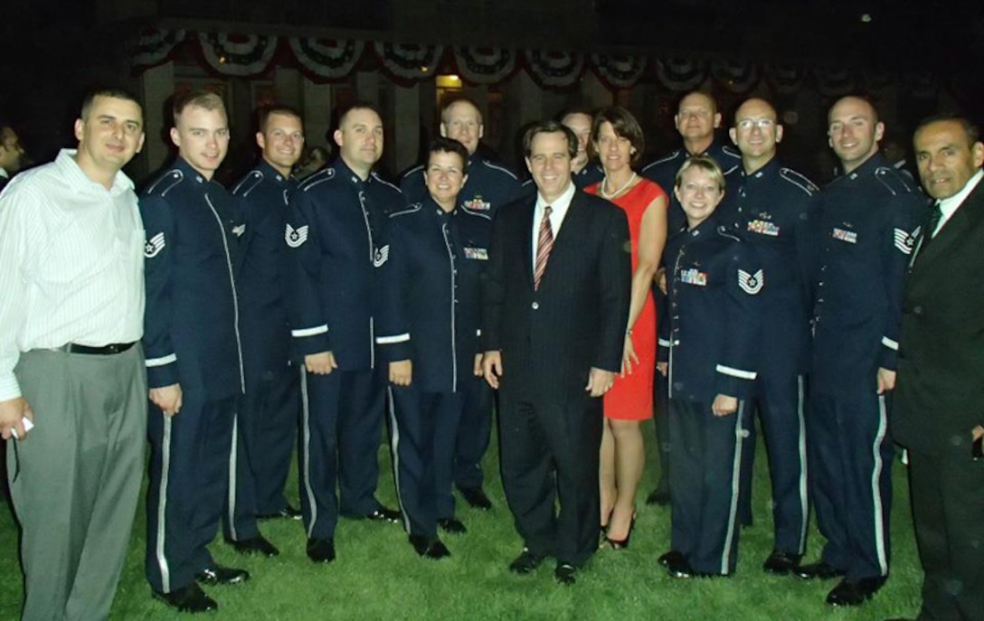 Rock Band members deployed to Jordan performed for the US Embassy.  Pictured here with civilian contacts and the US Ambassador to Jordan and his wife.