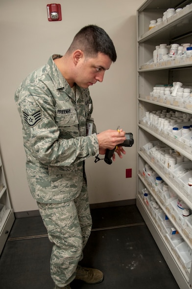 U.S. Air Force Staff Sgt. Brian Freeman, 23d Medical Group pharmacy technician, scans medications needing to be restocked at Moody Air Force Base, Aug. 5, 2013. The information gets uploaded into a computer so the medications can be reordered. (U.S. Air Force photo by Airman 1st Class Sandra Marrero/released)
