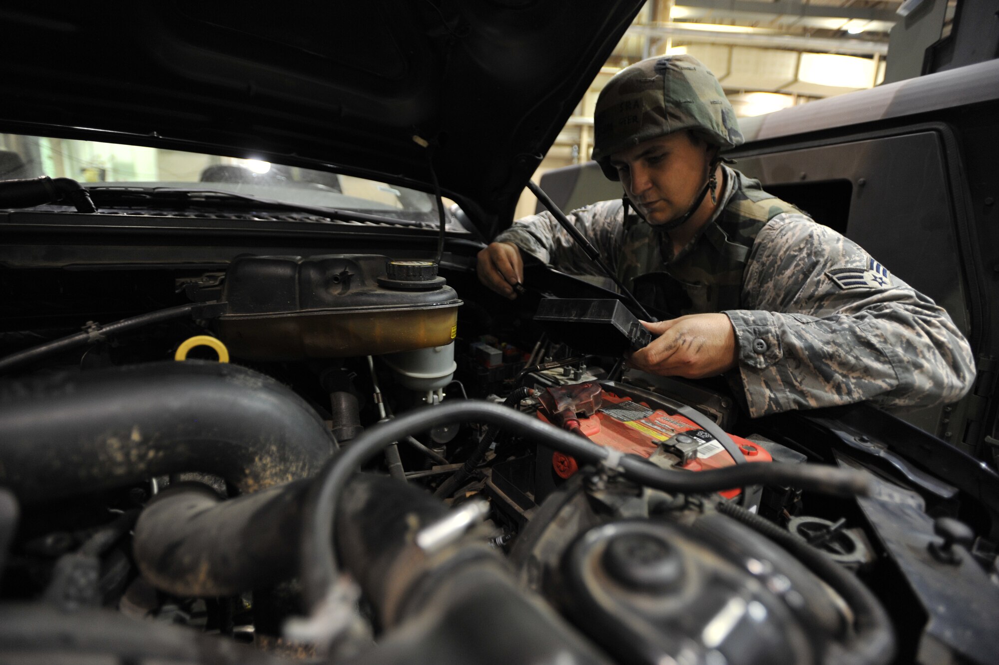 Senior Airman Michael Geer, 51st Logistics Readiness Squadron vehicle maintenance technician, inspects a vehicle part during Operational Readiness Exercise Beverly Midnight 13-03 at Osan Air Base, Republic of Korea, Aug. 9, 2013. VM techs like Geer are charged with keeping the 51st Fighter Wing’s entire vehicle fleet up and running. (U.S. Air Force photo/Senior Airman Siuta B. Ika)