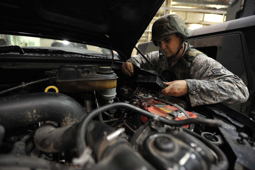 Senior Airman Michael Geer, 51st Logistics Readiness Squadron vehicle maintenance technician, inspects a vehicle part during Operational Readiness Exercise Beverly Midnight 13-03 at Osan Air Base, Republic of Korea, Aug. 9, 2013. VM techs like Geer are charged with keeping the 51st Fighter Wing’s entire vehicle fleet up and running. (U.S. Air Force photo/Senior Airman Siuta B. Ika)