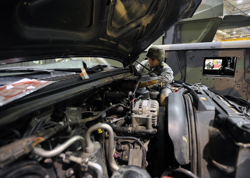 Senior Airman Michael Geer, 51st Logistics Readiness Squadron vehicle maintenance technician, inspects a vehicle part during Operational Readiness Exercise Beverly Midnight 13-03 at Osan Air Base, Republic of Korea, Aug. 9, 2013. Osan Airmen are in the fourth simulated wartime contingency exercise executed in 2013 that will test the base's ability to defend and execute the mission in a heightened state of readiness. (U.S. Air Force photo/Senior Airman Siuta B. Ika)