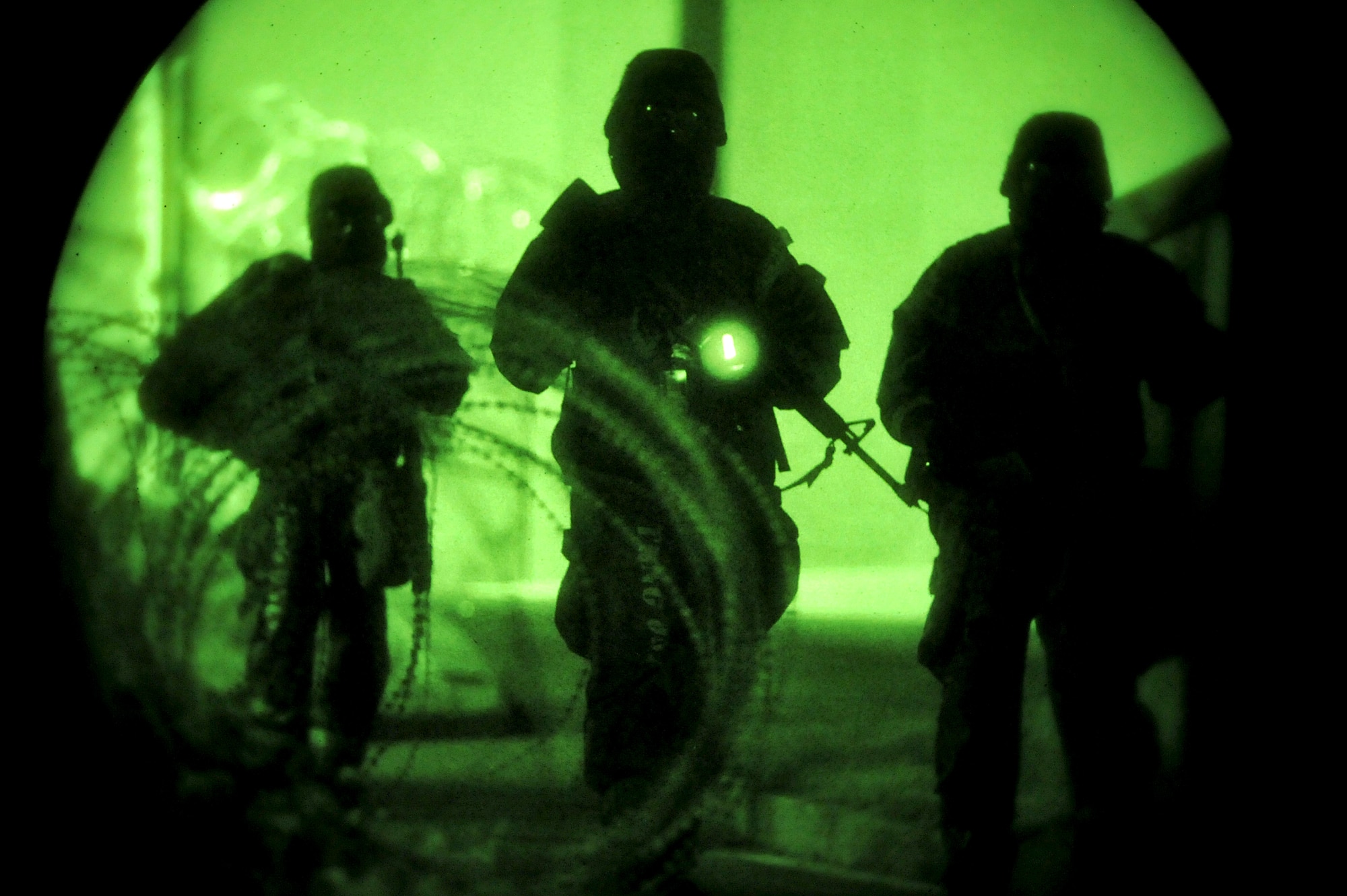 Members of the 51st Security Forces Squadron respond to a ground attack during Operational Readiness Exercise Beverly Midnight 13-03 at Osan Air Base, Republic of Korea, Aug. 8, 2013. This is Osan’s fourth simulated wartime contingency exercise in 2013 that will test the base’s ability to defend and execute the mission in a heightened state of readiness. (U.S. Air Force photo/Staff Sgt. Emerson Nuñez)