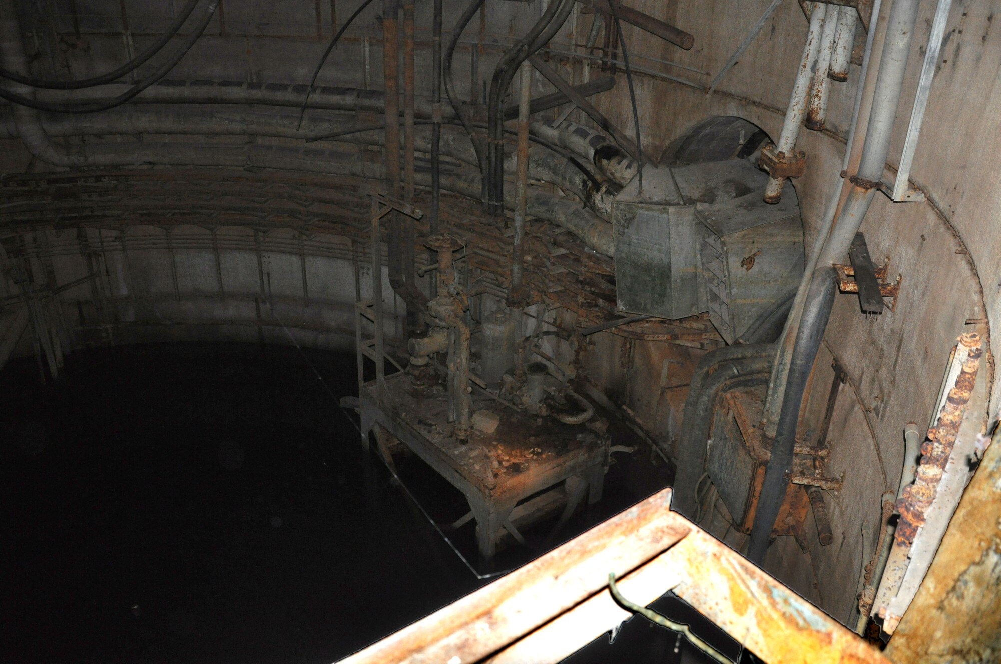 A junction box in silo 3 is partially flooded by natural ground water at the decommissioned Titan 1 Intercontinental Ballistic Missile Complex near Chico, Calif.  The now deactivated 851st Strategic Missile Squadron, Beale AFB, operated the ballistic missile facility until the 1960s. (U.S. Air Force photo by Senior Airman Adam Hamar)