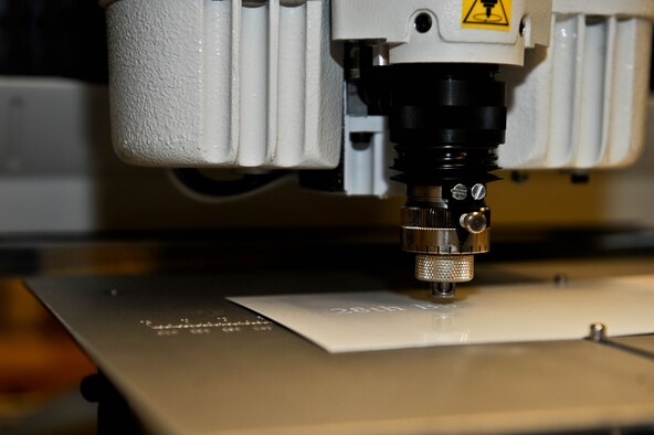 The Arts and Crafts Skills Development Center on Ellsworth Air Force Base has two versions of engraving machines, diamond tipped (shown) and a laser engraver to provide a more versatile option for engraving on different. The Arts and Crafts Center is able to create a wide variety of custom pieces for almost any occasion, open from 8:30 a.m. to 4:30 p.m. Monday through Thursday and 8:30 a.m. to 2 p.m. on Fridays. (U.S. Air Force photo by Airman 1st Class Rebecca Imwalle/Released)