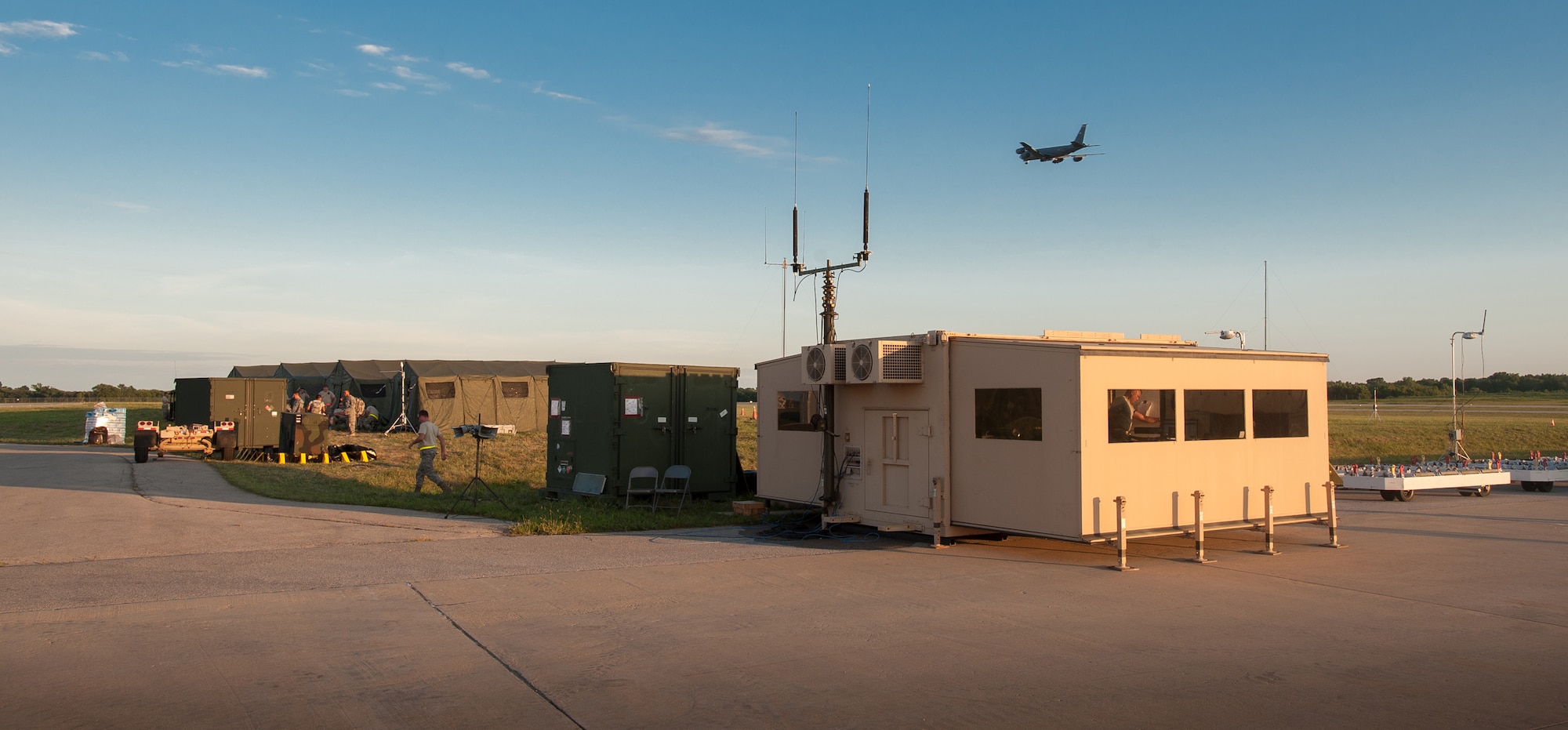 “Ops Town” serves as the command, control and communications headquarters for airfield operations at MidAmerica St. Louis Airport in Mascoutah, Ill., on Aug. 7, 2013, in support of Exercise Gateway Relief, a U.S. Transportation Command-directed earthquake-relief scenario. The Kentucky Air National Guard’s 123rd Contingency Response Group is teaming up with the U.S. Army’s 689th Rapid Port Opening Element in Fort Eustis, Va., through Aug. 9, for the exercise, providing for the reception and distribution of disaster-relief supplies. (U.S. Air National Guard photo by Maj. Dale Greer)