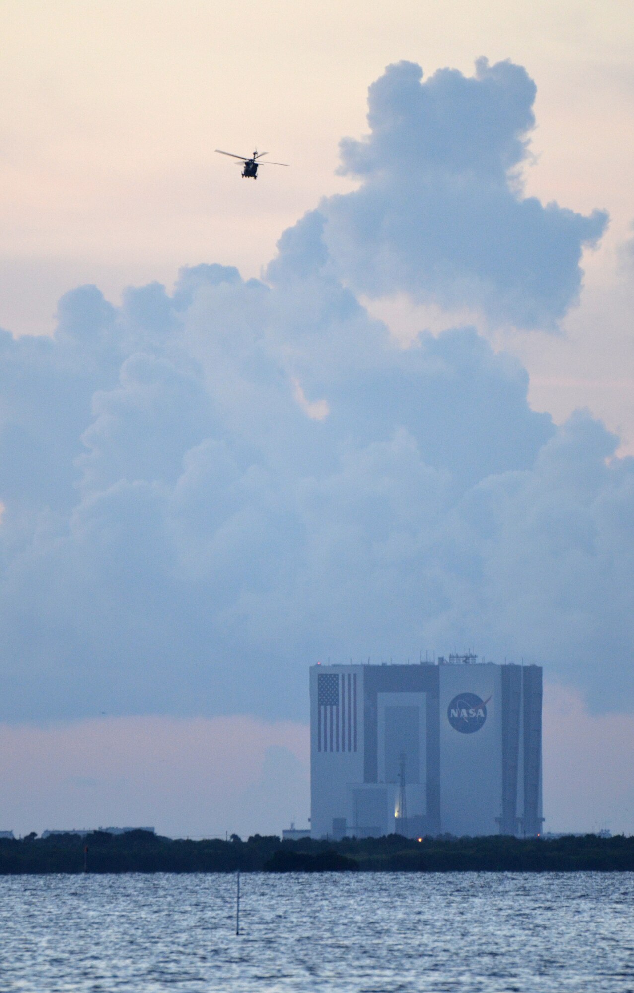 Airmen from the 920th Rescue Wing, Patrick Air Force Base, Fla., clear and secure the Eastern Range with a pair of HH-60G Pave Hawk helicoters for the August 7 United Launch Alliance-built Delta IV Heavy lift off from nearby Cape Canaveral Air Force Station. The rocket was carrying the sixth Wideband Global Satcom (WGS) satellite. Rescue Airmen provide support prior and during all East Coast rocket launches. (U.S. Air Force photo/Maj. Cathleen Snow)