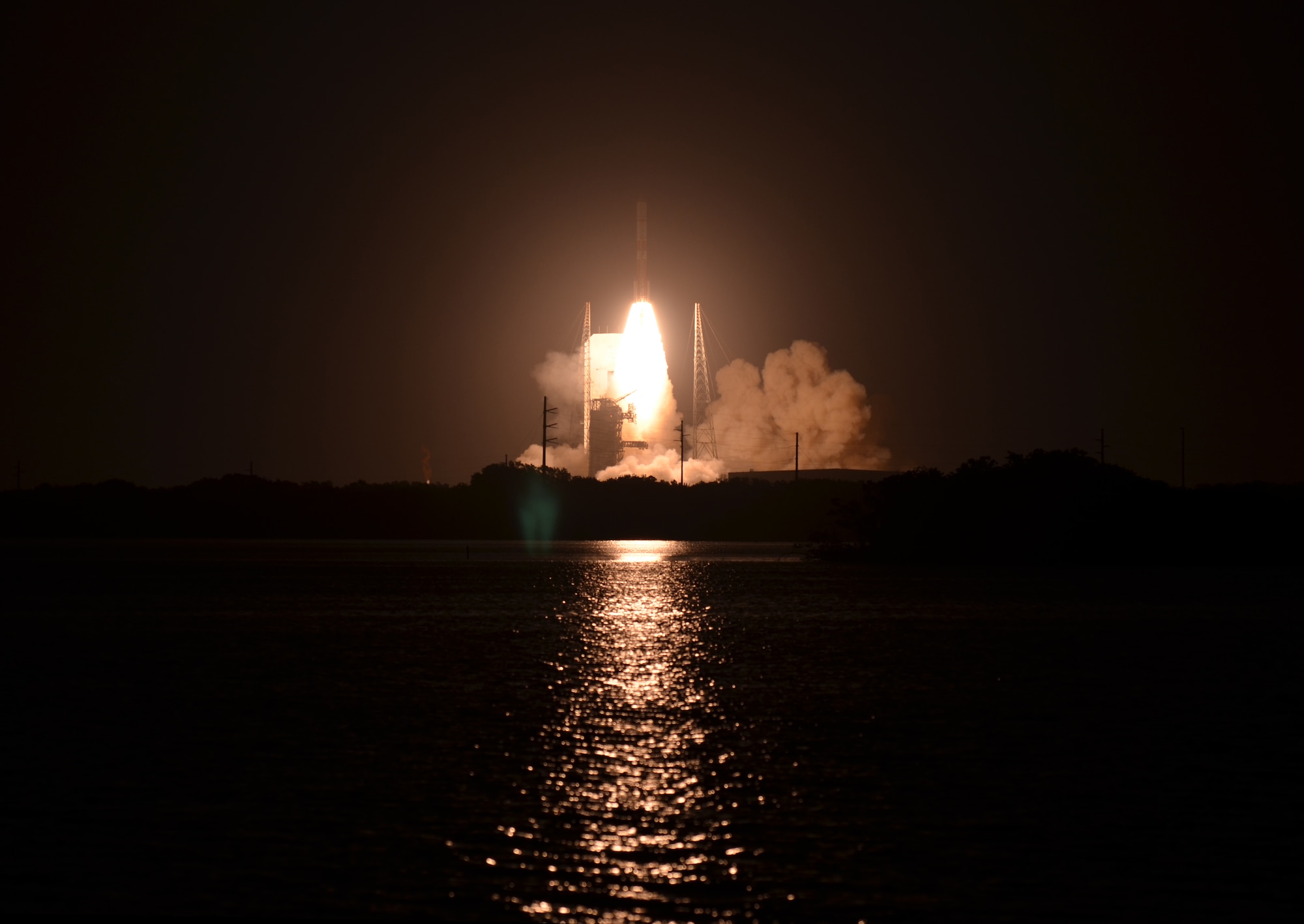 Airmen from the 920th Rescue Wing, Patrick Air Force Base, Fla., clear and secure the Eastern Range for the August 7 United Launch Alliance-built Delta IV Heavy lift off from nearby Cape Canaveral Air Force Station. The rocket was carrying the sixth Wideband Global Satcom (WGS) satellite for the U.S. military. (U.S. Air Force photo/Maj. Cathleen Snow)