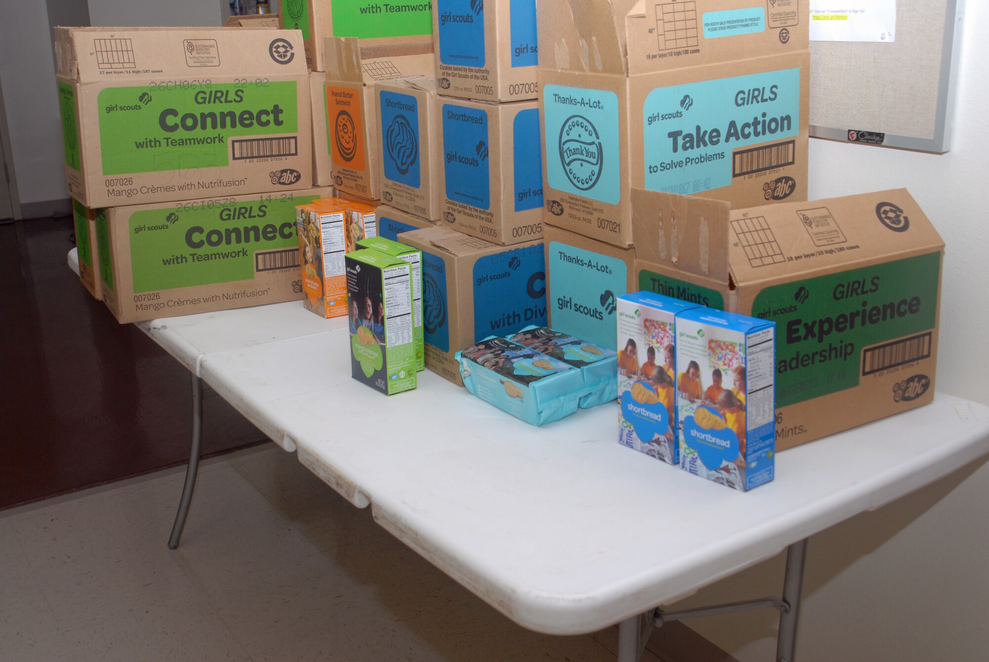 GOODFELLOW AIR FORCE BASE, Texas – Girl Scout cookies sit on a table at the Crossroads Student Ministry Center Aug. 6. Twenty cases were given to the Crossroads by the Girl Scouts promoting community relations. (U.S. Air Force photo/ Airman 1st Class Breonna Veal)