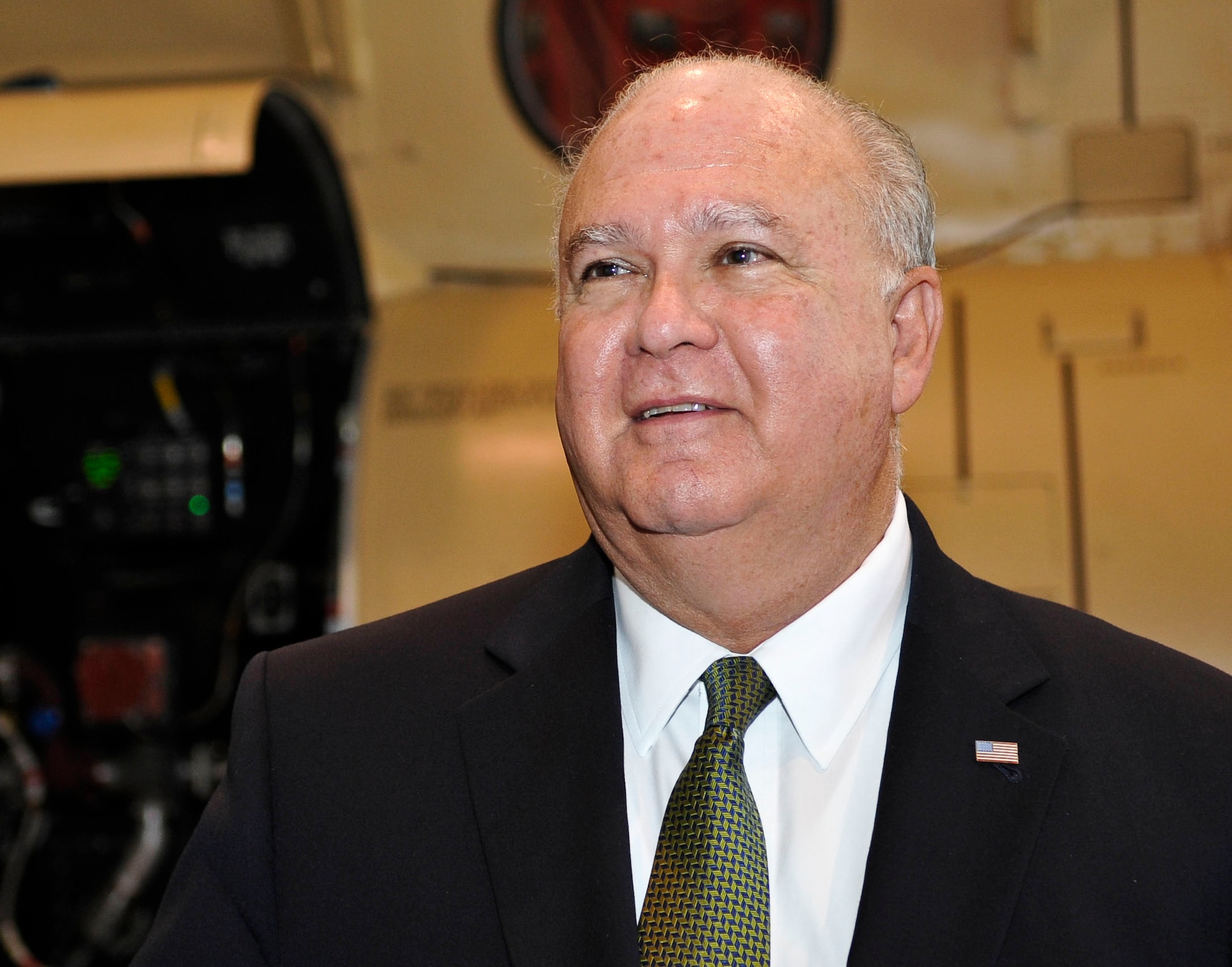 Under Secretary of the Army Joseph W. Westphal listens to a brief from an instructor at the 128th Aviation Brigade at Fort Eustis, Va., August 7, 2013. Westphal stopped by the brigade during his visit to the U.S. Army Training and Doctrine Command to discuss key issues facing the Army today. (U.S. Air Force photo by Staff Sgt. Wesley Farnsworth/Released) 