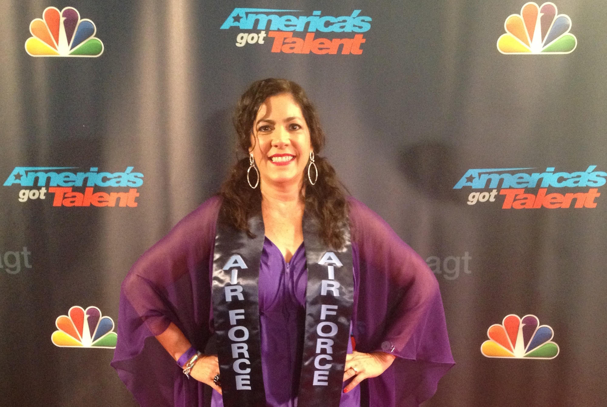 NEW YORK CITY -- Dawn McClure, wife of Air Force Civil Engineer Center Housing Director Col. Gregory McClure, poses during the American Military Spouses Choir's
appearance on NBC's hit TV show, "America's Got Talent."  McClure is one of 36 military spouses who performed recently at Radio City Music Hall during the show's quarterfinals and found out Aug. 7 that they'd made the show's semifinals.  (Courtesy photo)