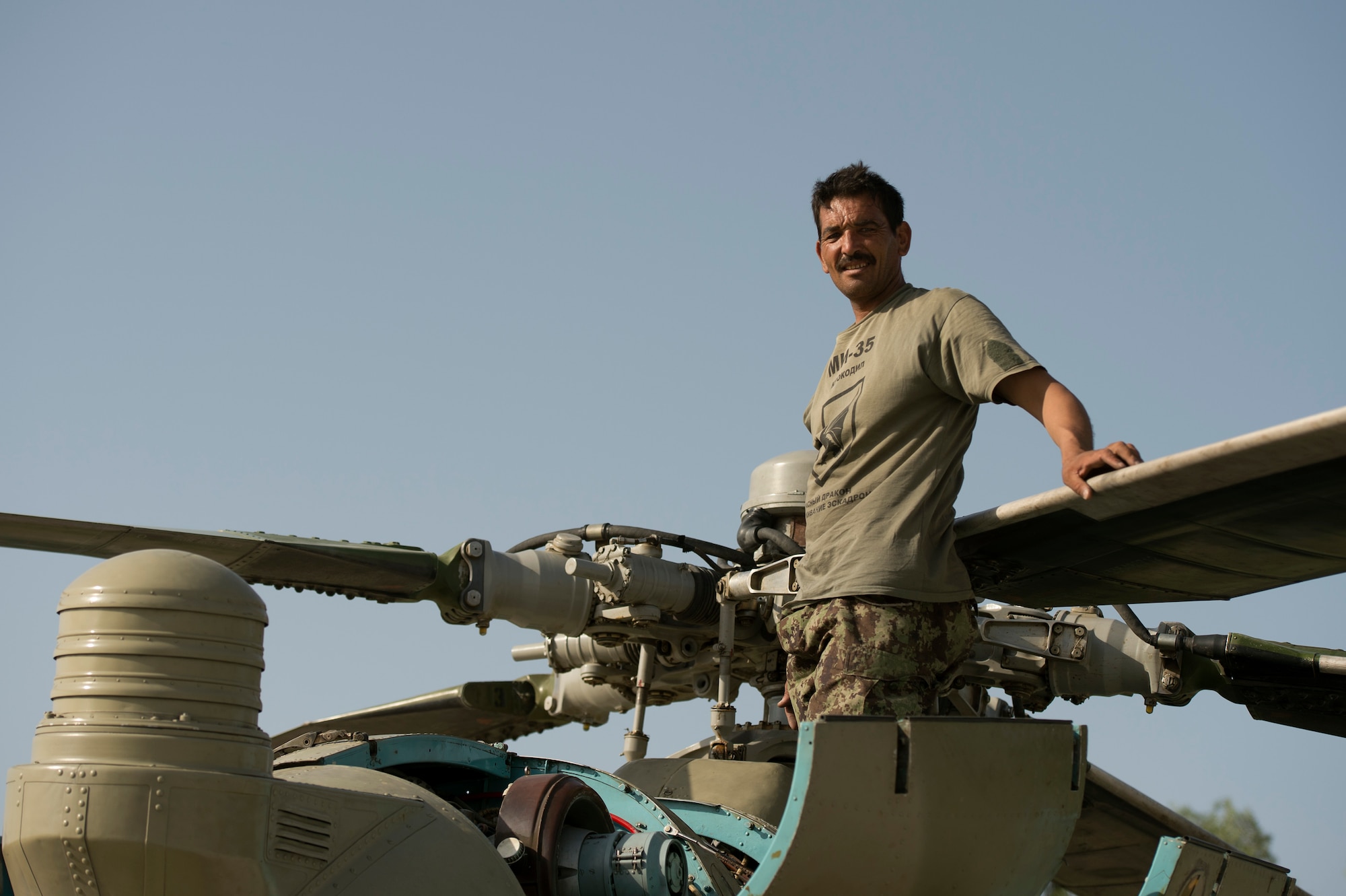 Afghan Air Force 1st Lt. Said Akbar, post-flights an Mi-35 helicopter after arriving at Jalalabad Airfield, Afghanistan to prepare for Operation Seemorgh July 22, 2013. Operation Seemorgh, named after a mythical bird, is the largest Afghan-led combat operation in more than 30 years, combining air and ground forces in an offensive focused on Taliban in Loghar Province. (U.S. Air Force Photo/Master Sgt. Ben Bloker)