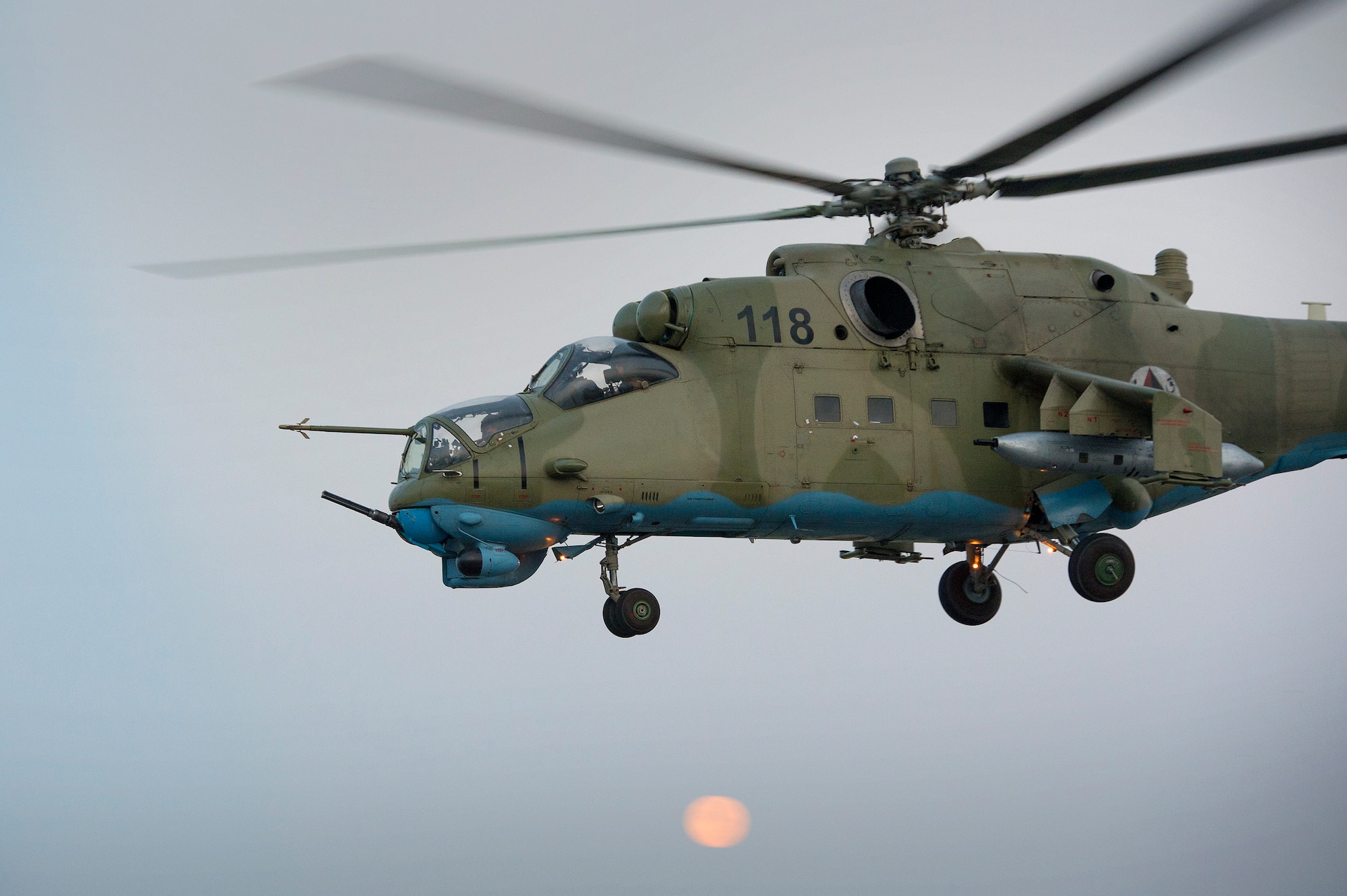 An Afghan Air Force Mi-35 helicopter departs for Loghar province in the early morning hours of July 23, 2013 on the first day of Operation Seemorgh at Jalalabad Airfield, Afghanistan. Operation Seemorgh, named after a mythical bird, is the largest Afghan-led combat operation in more than 30 years, combining air and ground forces in an offensive focused on Taliban in Loghar Province. (U.S. Air Force Photo/Master Sgt. Ben Bloker)