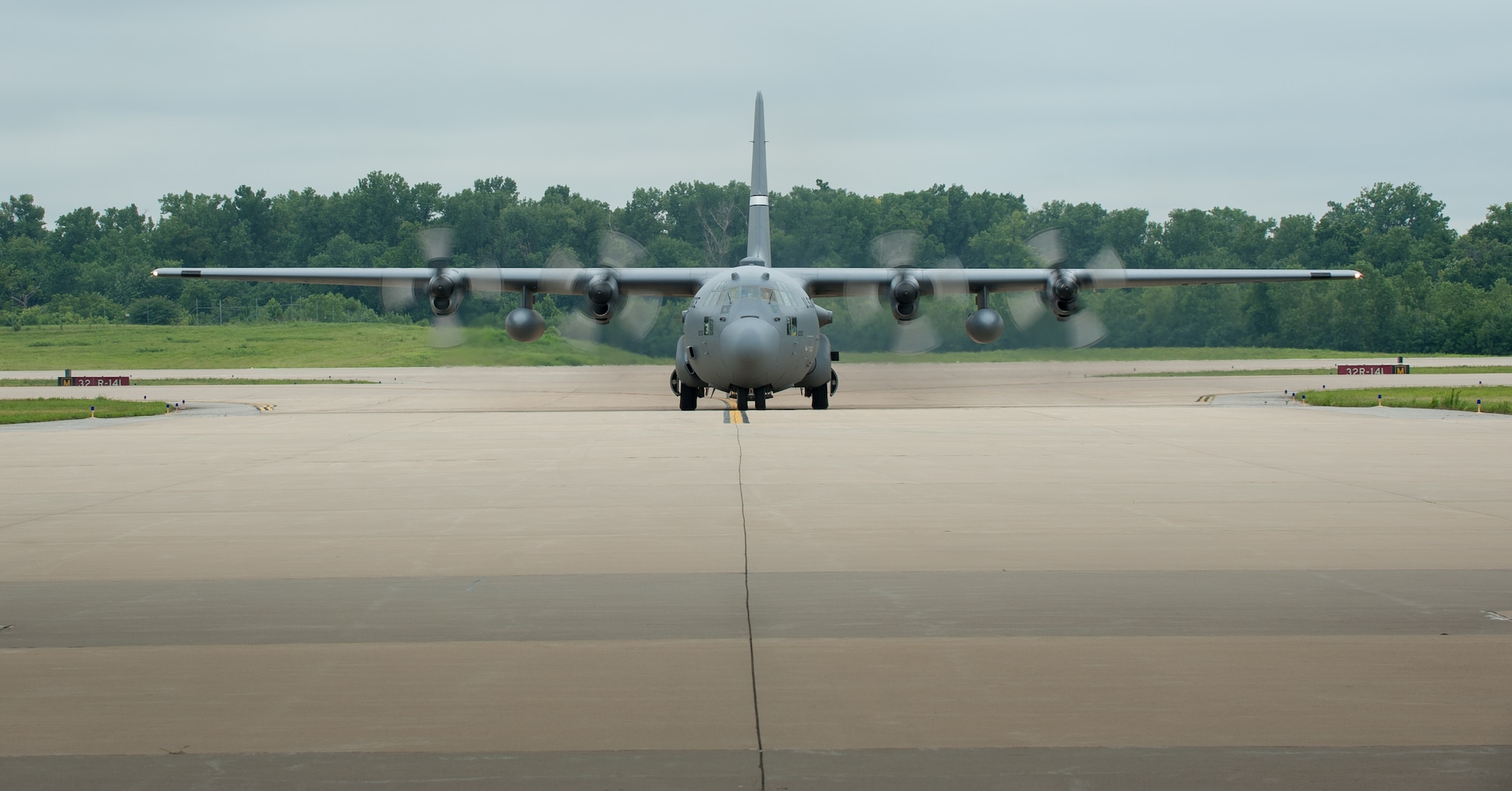 A Kentucky Air National Guard C-130 Hercules aircraft taxies into MidAmerica St. Louis Airport in Mascoutah, Ill., on Aug. 5, 2013, as part of Exercise Gateway Relief, a U.S. Transportation Command-directed earthquake-response scenario. The Kentucky Air Guard’s 123rd Contingency Response Group is joining forces with the U.S. Army’s active-duty 689th Rapid Port Opening Element from Fort Eustis, Va., to stand up and operate a Joint Task Force-Port Opening, which combines an Air Force Aerial Port of Debarkation with an Army trucking and distribution unit. The aerial port ensures the smooth flow of cargo and relief supplies into affected areas by airlift, while the trucking unit facilitates their final distribution over land. (U.S. Air National Guard photo by Maj. Dale Greer)